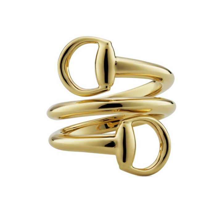 Gold spiral ring on a white background