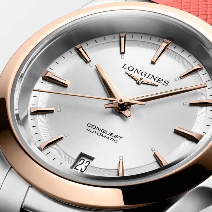 Longines Conquest Automatic watch with rose gold accents and silver dial